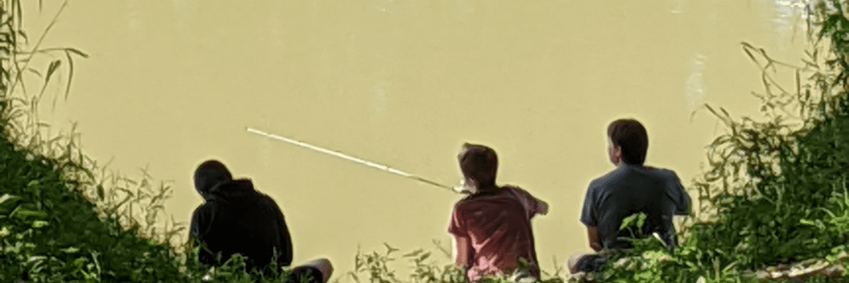 Father and Two Sons Fishing